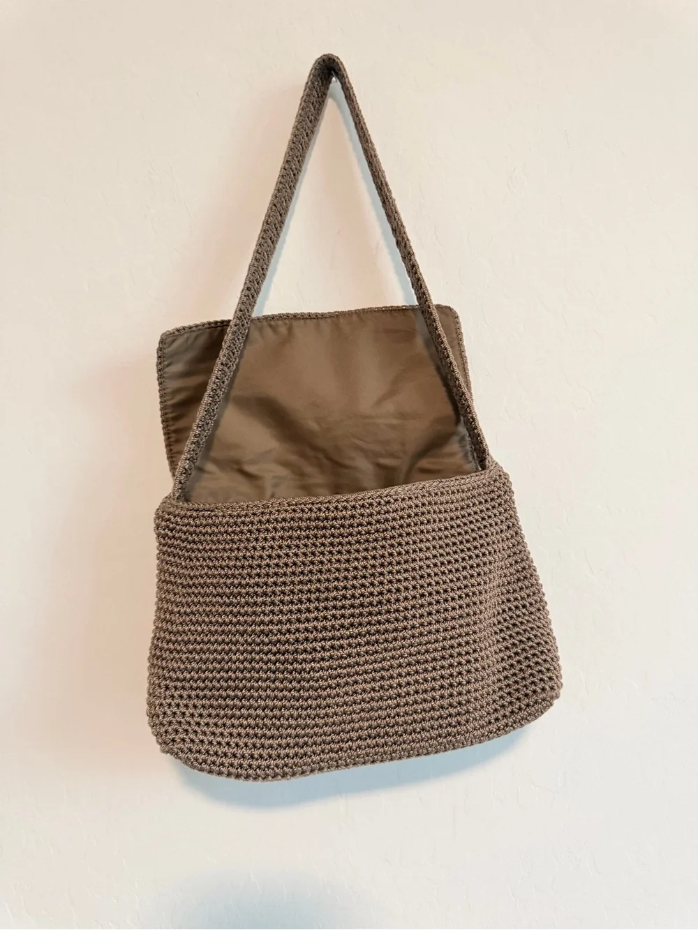The Sak Brown Crochet Shoulder Bag with Fold-Over Flap